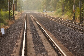 Image showing Rrails of trains in late sunlight