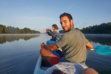 Image showing Canoe tour on a river