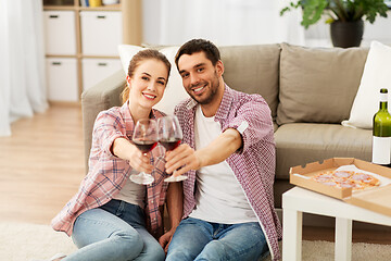 Image showing happy couple drinking red wine at home