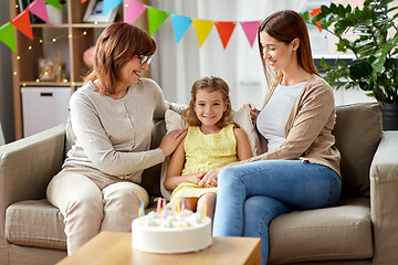 Image showing mother, daughter and grandmother at birthday party