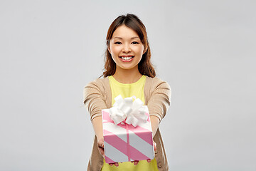 Image showing happy african american woman with birthday present