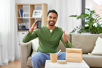 Image showing indian man using smartphone for food delivery