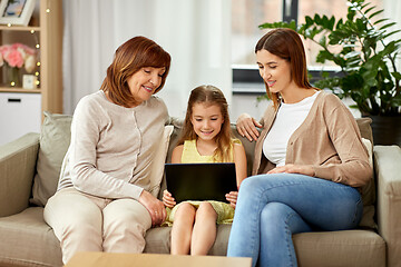 Image showing mother, daughter and grandmother with tablet pc