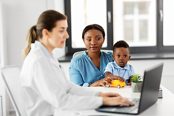 Image showing mother with baby son and doctor at clinic