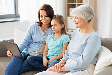 Image showing mother, daughter and grandmother with tablet pc