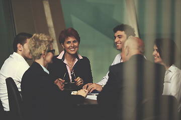 Image showing business people group on meeting at modern bright office