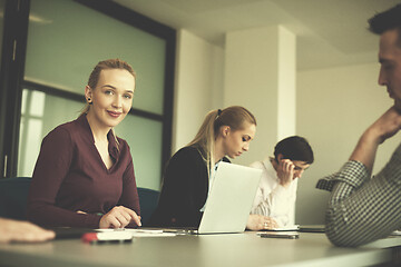 Image showing young business people group on team meeting at modern office