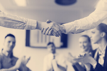 Image showing business womans handshake