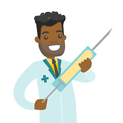 Image showing African doctor holding a syringe with vaccine.