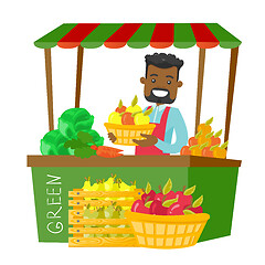 Image showing African street seller with fruits and vegetables