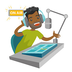 Image showing African radio host working at the radio studio.