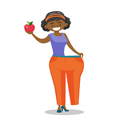 Image showing Slim woman in pants showing the results of diet.