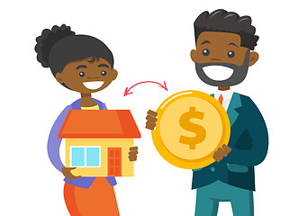 Image showing Realtor exchanging a house to the coin of a client