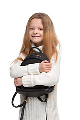 Image showing Full length portrait of cute little kid in stylish jeans clothes looking at camera and smiling