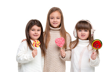 Image showing portrait of cute little kids in stylish clothes looking at camera and smiling