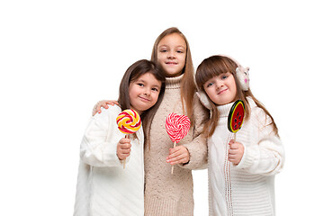 Image showing portrait of cute little kids in stylish clothes looking at camera and smiling