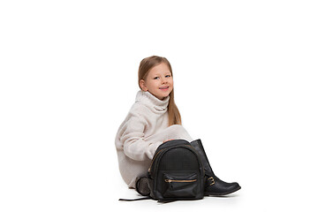 Image showing Full length portrait of cute little kid in stylish jeans clothes looking at camera and smiling