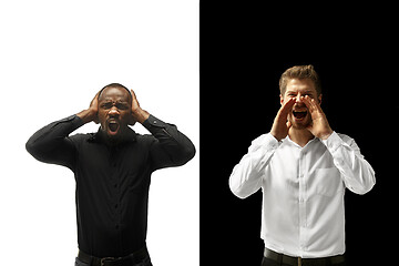 Image showing success happy afro and caucasian men. Mixed couple. Human facial emotions concept.