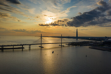 Image showing Sunset sky view bridge and skyscraper