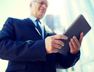 Image showing businessman with tablet pc outdoors