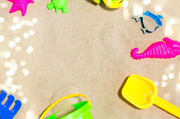 Image showing close up of sand toys kit on summer beach