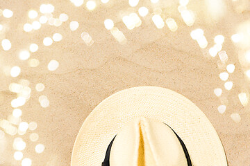 Image showing straw hat on beach sand