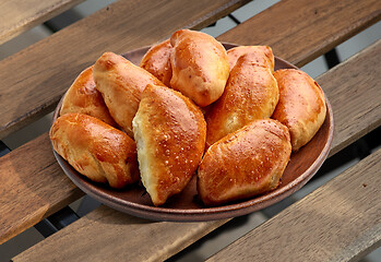 Image showing home baked meat buns 