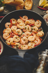 Image showing Tasty shrimp tails fried in butter with, garlic, parsley, white wine chili. With various ingredients