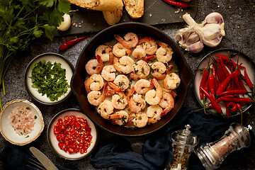 Image showing Tasty shrimp tails fried in butter with, garlic, parsley, white wine chili. With various ingredients