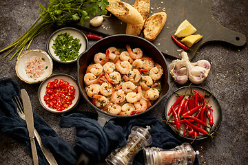 Image showing Tasty shrimp tails fried in butter with, garlic, parsley, white wine chili. With various ingredients