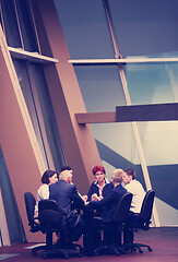 Image showing business people group on meeting at modern bright office