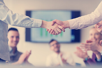 Image showing business womans handshake