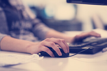 Image showing young programmer writing programming code