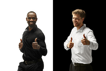 Image showing success happy afro and caucasian men. Mixed couple. Human facial emotions concept.