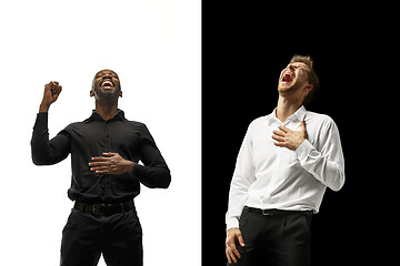 Image showing success happy afro and caucasian men. Mixed couple. Human facial emotions concept.