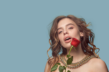 Image showing Beautiful young girl in studio with pearl jewelry - earrings, bracelet, necklace.