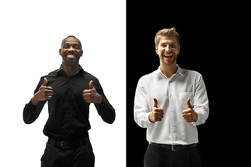 Image showing success happy afro and caucasian men. Mixed couple. Human facial emotions concept.