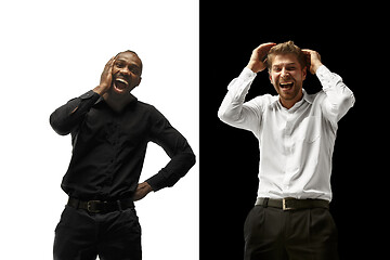 Image showing success happy afro and caucasian men. Mixed couple. Human facial emotions concept.