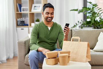 Image showing indian man using smartphone for food delivery