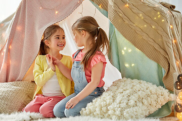 Image showing little girls talking in kids tent at home