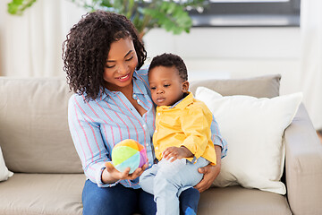 Image showing mother and baby playing with ball at home