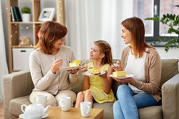 Image showing mother, daughter and grandmother eating cake