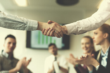 Image showing business womans handshake