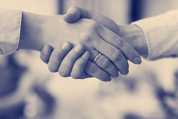 Image showing business womans handshake