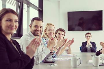 Image showing Group of young people meeting in startup office