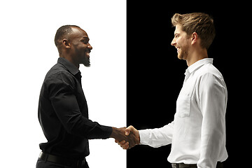 Image showing success happy afro and caucasian men. Mixed couple. Human facial emotions concept.