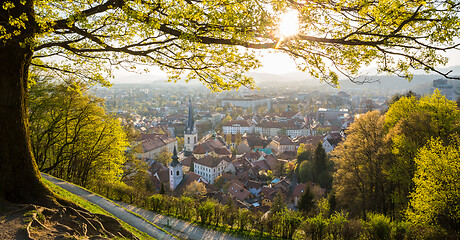 Image showing Panoramic view of Ljubljana, capital of Slovenia. Roooftops of Ljubljanas old medieval city center seen from Ljubljanas castle park at sunset