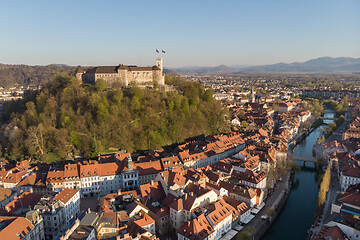 Image showing Aerial drone panoramic view of Ljubljana, capital of Slovenia in warm afternoon sun