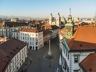 Image showing Panoramic aerial view of Town Square in Ljubljana, capital of Slovenia, at sunset. Empty streets of Slovenian capital during corona virus pandemic social distancing measures in 2020