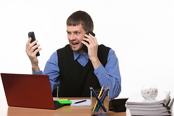 Image showing exasperated boss on the phone gives orders